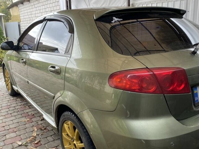 Зелений Шевроле Лачетті, об'ємом двигуна 1.8 л та пробігом 221 тис. км за 4200 $, фото 2 на Automoto.ua