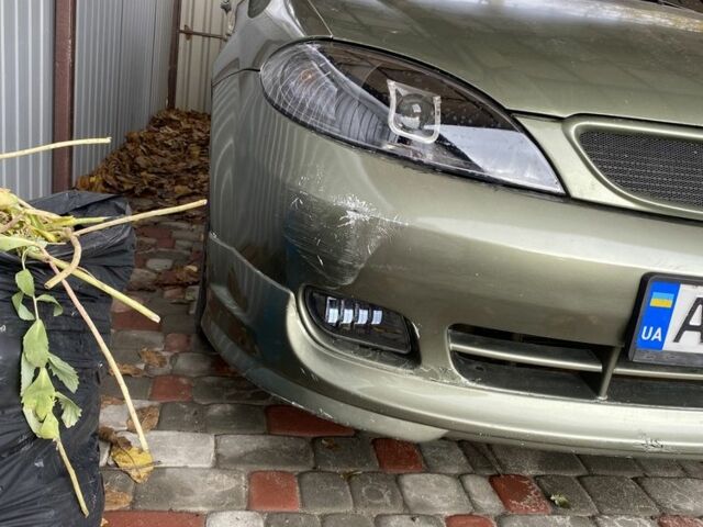Зелений Шевроле Лачетті, об'ємом двигуна 1.8 л та пробігом 221 тис. км за 4200 $, фото 14 на Automoto.ua