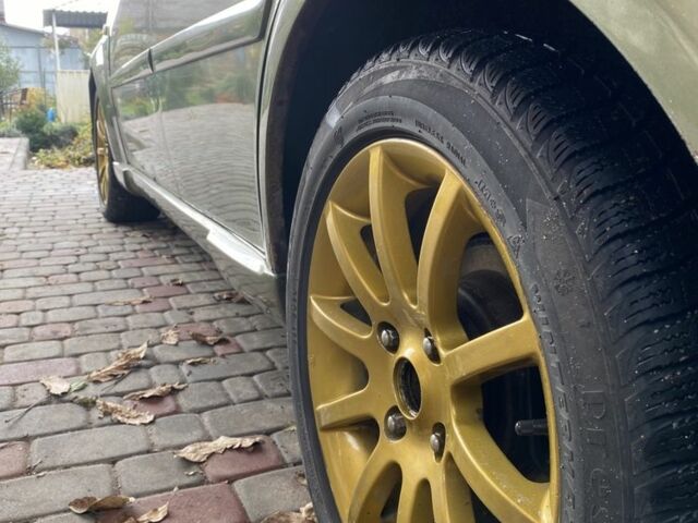 Зелений Шевроле Лачетті, об'ємом двигуна 1.8 л та пробігом 221 тис. км за 4200 $, фото 13 на Automoto.ua