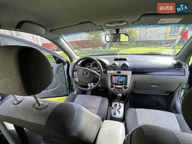 Зелений Шевроле Лачетті, об'ємом двигуна 1.8 л та пробігом 225 тис. км за 3950 $, фото 13 на Automoto.ua