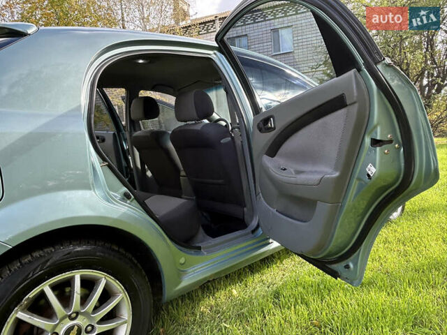 Зелений Шевроле Лачетті, об'ємом двигуна 1.8 л та пробігом 225 тис. км за 3950 $, фото 11 на Automoto.ua