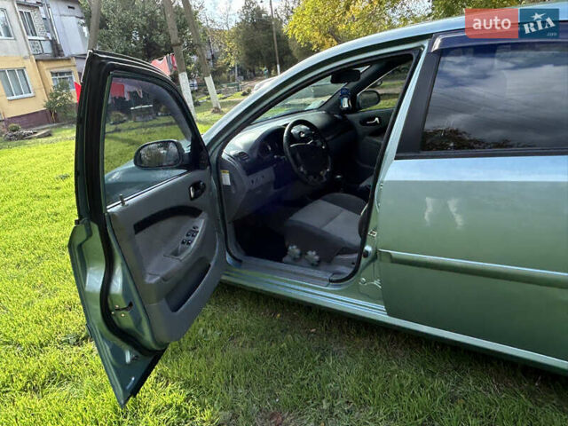 Зелений Шевроле Лачетті, об'ємом двигуна 1.8 л та пробігом 225 тис. км за 3950 $, фото 9 на Automoto.ua