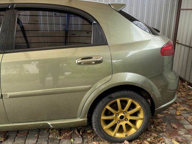 Зелений Шевроле Лачетті, об'ємом двигуна 1.8 л та пробігом 221 тис. км за 4200 $, фото 4 на Automoto.ua