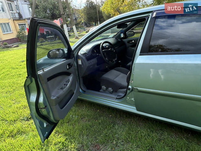Зелений Шевроле Лачетті, об'ємом двигуна 1.8 л та пробігом 225 тис. км за 3950 $, фото 8 на Automoto.ua