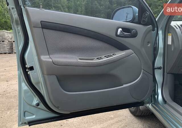 Зелений Шевроле Лачетті, об'ємом двигуна 1.8 л та пробігом 208 тис. км за 4350 $, фото 9 на Automoto.ua