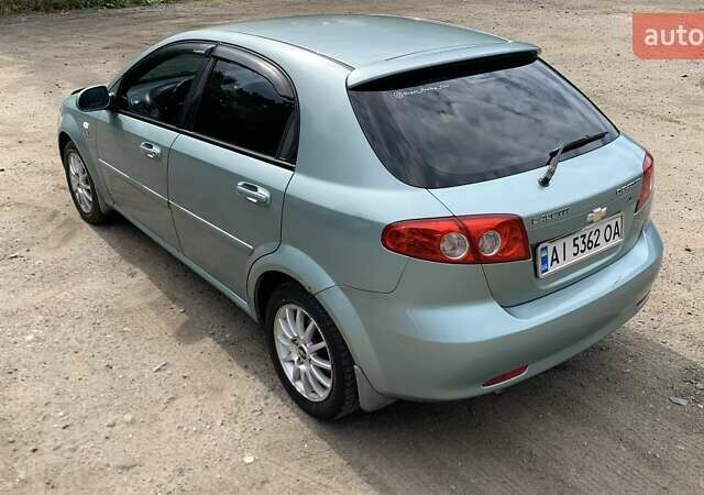 Зелений Шевроле Лачетті, об'ємом двигуна 1.8 л та пробігом 208 тис. км за 4350 $, фото 25 на Automoto.ua