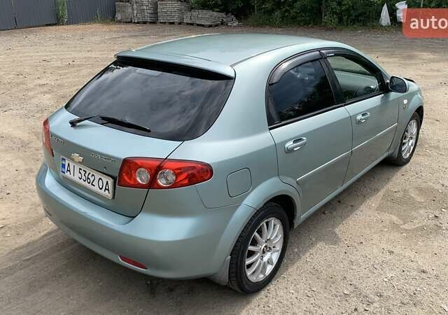 Зелений Шевроле Лачетті, об'ємом двигуна 1.8 л та пробігом 208 тис. км за 4350 $, фото 24 на Automoto.ua