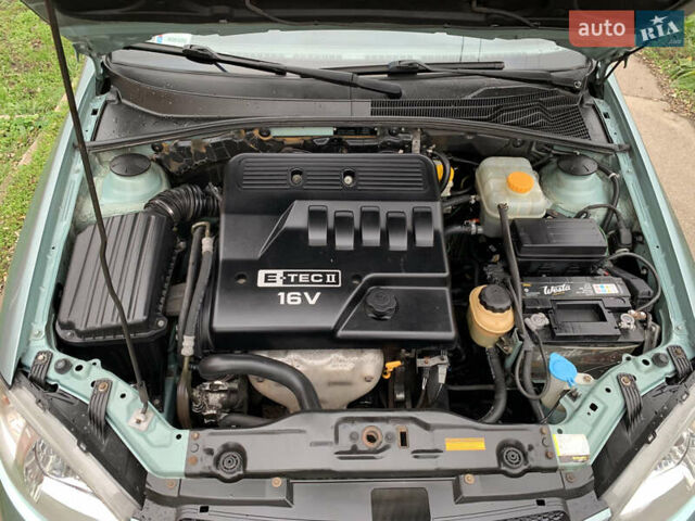 Зеленый Шевроле Лачетти, объемом двигателя 1.6 л и пробегом 270 тыс. км за 3650 $, фото 15 на Automoto.ua