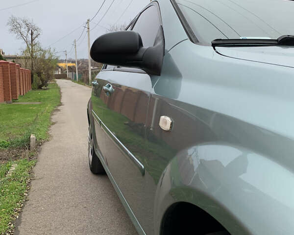 Зеленый Шевроле Лачетти, объемом двигателя 1.6 л и пробегом 270 тыс. км за 3650 $, фото 19 на Automoto.ua