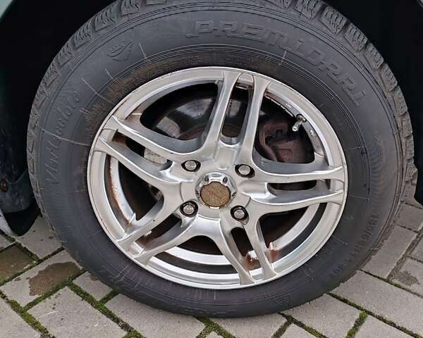 Зеленый Шевроле Лачетти, объемом двигателя 1.6 л и пробегом 277 тыс. км за 3750 $, фото 11 на Automoto.ua