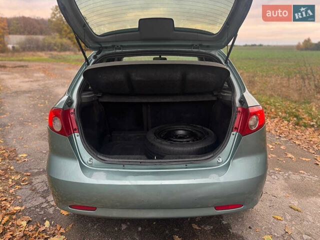 Зеленый Шевроле Лачетти, объемом двигателя 1.8 л и пробегом 228 тыс. км за 3400 $, фото 10 на Automoto.ua