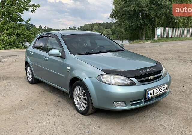 Зелений Шевроле Лачетті, об'ємом двигуна 1.8 л та пробігом 208 тис. км за 4350 $, фото 19 на Automoto.ua