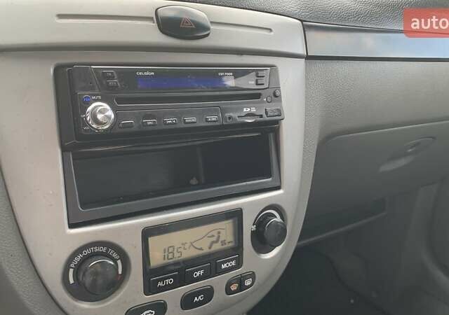 Зелений Шевроле Лачетті, об'ємом двигуна 1.8 л та пробігом 208 тис. км за 4350 $, фото 14 на Automoto.ua