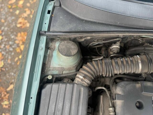 Зеленый Шевроле Лачетти, объемом двигателя 1.8 л и пробегом 227 тыс. км за 3600 $, фото 12 на Automoto.ua