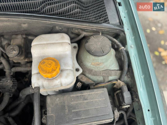 Зеленый Шевроле Лачетти, объемом двигателя 1.8 л и пробегом 228 тыс. км за 3400 $, фото 11 на Automoto.ua