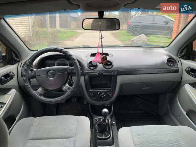 Зеленый Шевроле Лачетти, объемом двигателя 1.6 л и пробегом 270 тыс. км за 3650 $, фото 5 на Automoto.ua