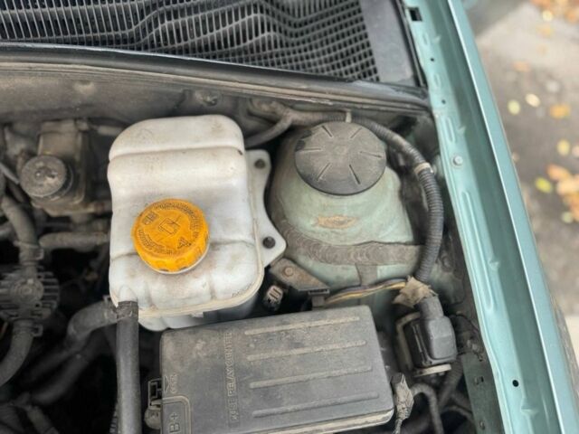 Зеленый Шевроле Лачетти, объемом двигателя 1.8 л и пробегом 227 тыс. км за 3600 $, фото 11 на Automoto.ua