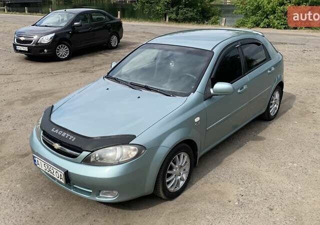 Зелений Шевроле Лачетті, об'ємом двигуна 1.8 л та пробігом 208 тис. км за 4350 $, фото 23 на Automoto.ua