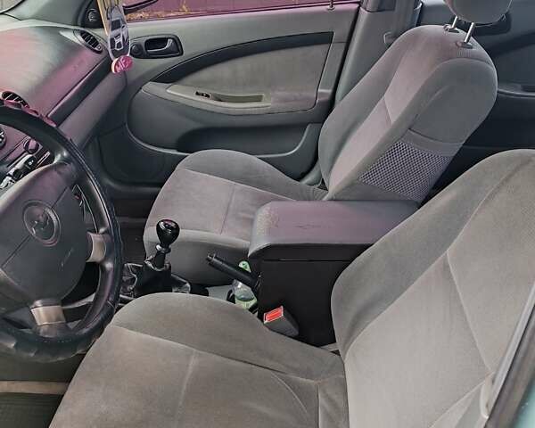 Зеленый Шевроле Лачетти, объемом двигателя 1.6 л и пробегом 277 тыс. км за 3750 $, фото 10 на Automoto.ua