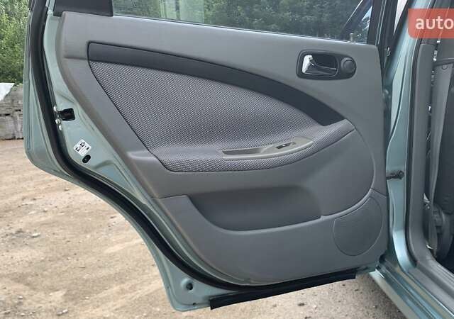 Зелений Шевроле Лачетті, об'ємом двигуна 1.8 л та пробігом 208 тис. км за 4350 $, фото 10 на Automoto.ua