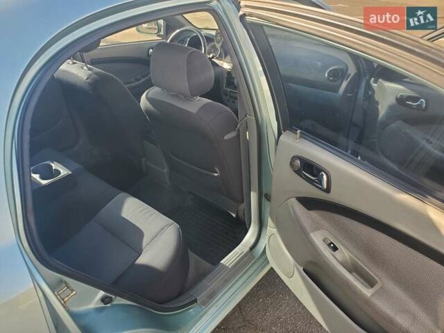 Зелений Шевроле Лачетті, об'ємом двигуна 1.8 л та пробігом 189 тис. км за 3700 $, фото 9 на Automoto.ua