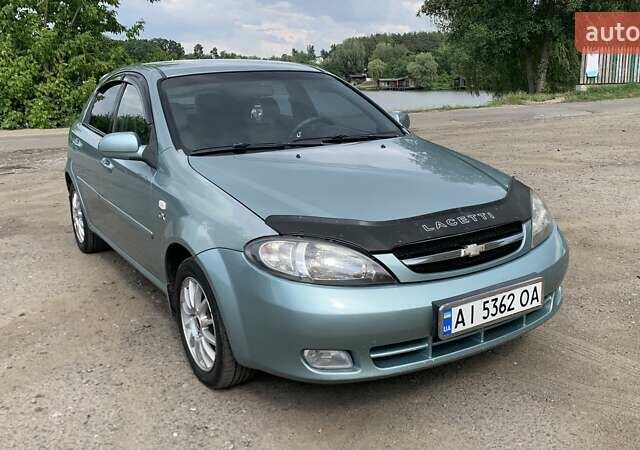 Зелений Шевроле Лачетті, об'ємом двигуна 1.8 л та пробігом 208 тис. км за 4350 $, фото 17 на Automoto.ua