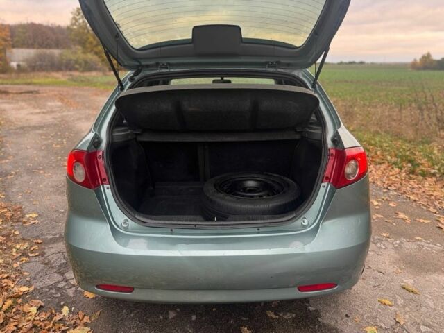 Зеленый Шевроле Лачетти, объемом двигателя 1.8 л и пробегом 227 тыс. км за 3600 $, фото 13 на Automoto.ua