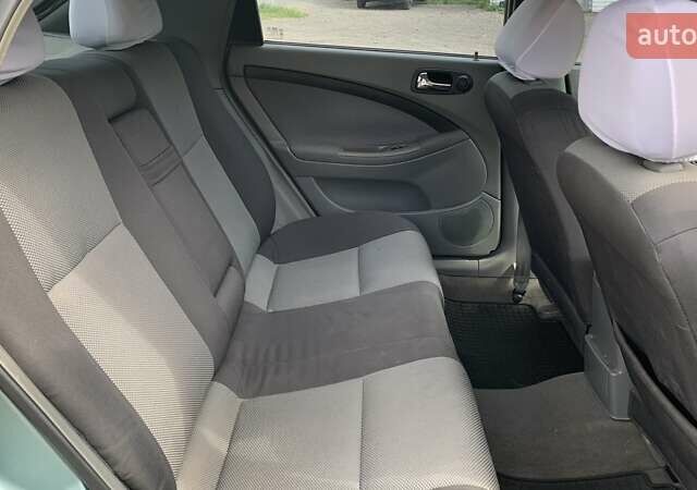 Зелений Шевроле Лачетті, об'ємом двигуна 1.8 л та пробігом 208 тис. км за 4350 $, фото 7 на Automoto.ua