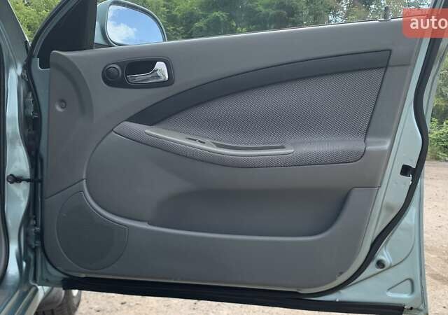 Зелений Шевроле Лачетті, об'ємом двигуна 1.8 л та пробігом 208 тис. км за 4350 $, фото 12 на Automoto.ua