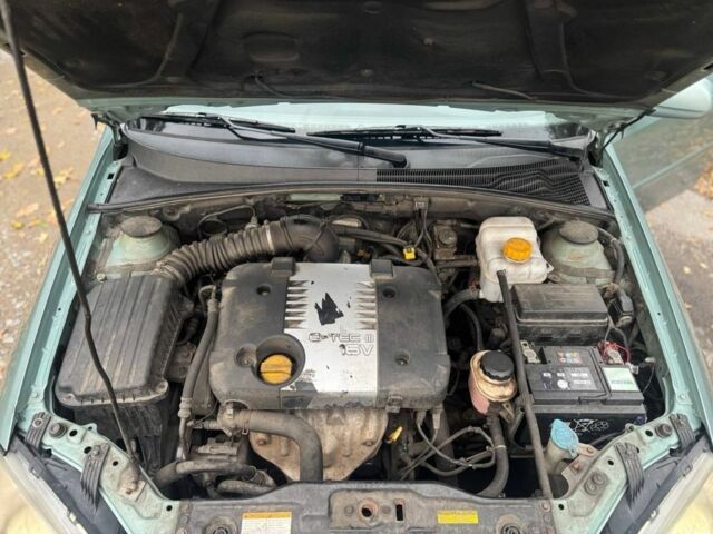 Зеленый Шевроле Лачетти, объемом двигателя 1.8 л и пробегом 227 тыс. км за 3600 $, фото 10 на Automoto.ua