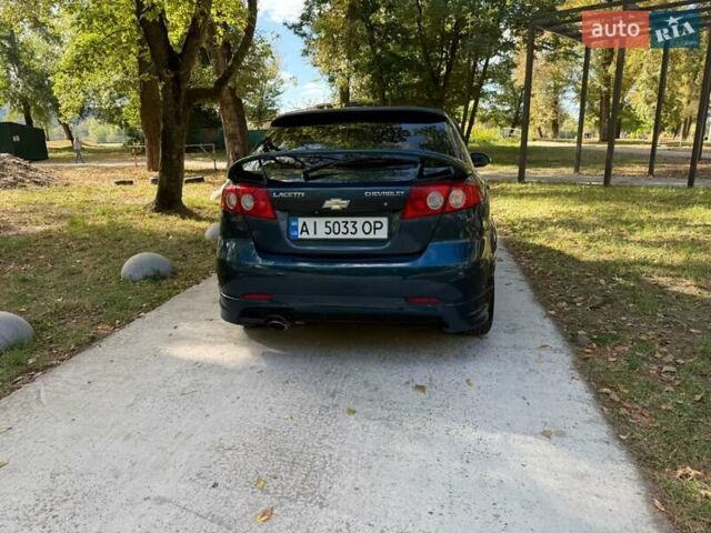 Зелений Шевроле Лачетті, об'ємом двигуна 1.6 л та пробігом 270 тис. км за 3999 $, фото 11 на Automoto.ua