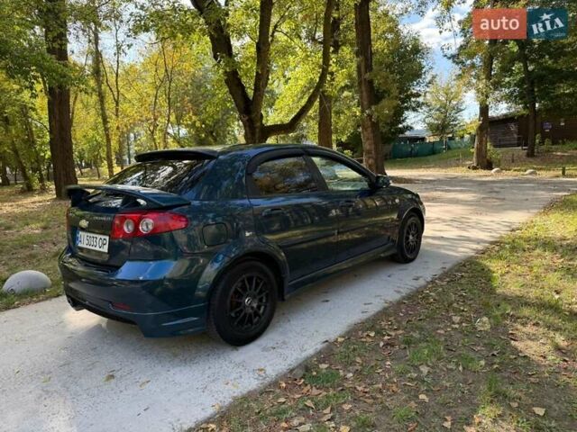 Зелений Шевроле Лачетті, об'ємом двигуна 1.6 л та пробігом 270 тис. км за 3999 $, фото 9 на Automoto.ua