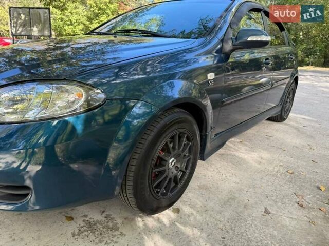 Зелений Шевроле Лачетті, об'ємом двигуна 1.6 л та пробігом 270 тис. км за 3999 $, фото 12 на Automoto.ua