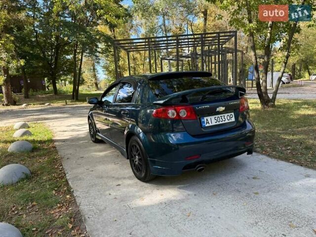 Зелений Шевроле Лачетті, об'ємом двигуна 1.6 л та пробігом 270 тис. км за 3999 $, фото 7 на Automoto.ua