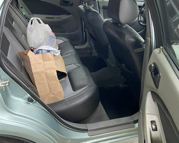 Зеленый Шевроле Лачетти, объемом двигателя 1.6 л и пробегом 308 тыс. км за 5200 $, фото 9 на Automoto.ua