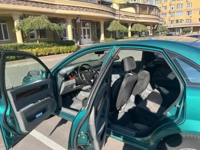 Зеленый Шевроле Лачетти, объемом двигателя 1.8 л и пробегом 256 тыс. км за 3500 $, фото 2 на Automoto.ua