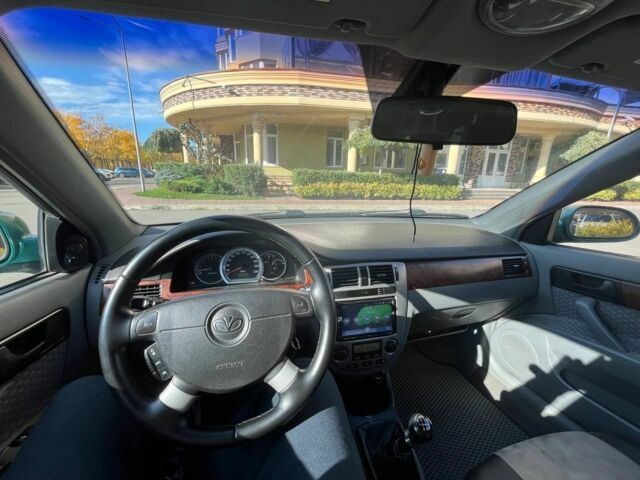 Зеленый Шевроле Лачетти, объемом двигателя 1.8 л и пробегом 256 тыс. км за 3500 $, фото 4 на Automoto.ua