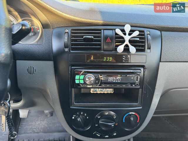 Зелений Шевроле Лачетті, об'ємом двигуна 1.8 л та пробігом 296 тис. км за 4200 $, фото 46 на Automoto.ua