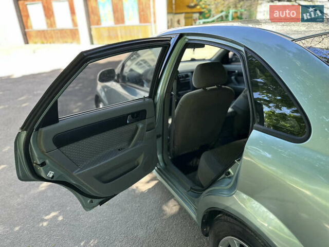 Зеленый Шевроле Лачетти, объемом двигателя 1.8 л и пробегом 355 тыс. км за 2999 $, фото 34 на Automoto.ua