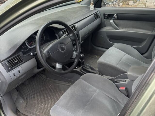 Зелений Шевроле Лачетті, об'ємом двигуна 1.8 л та пробігом 232 тис. км за 2500 $, фото 7 на Automoto.ua