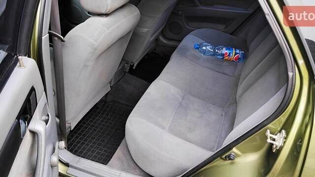 Зелений Шевроле Лачетті, об'ємом двигуна 1.8 л та пробігом 388 тис. км за 5399 $, фото 8 на Automoto.ua