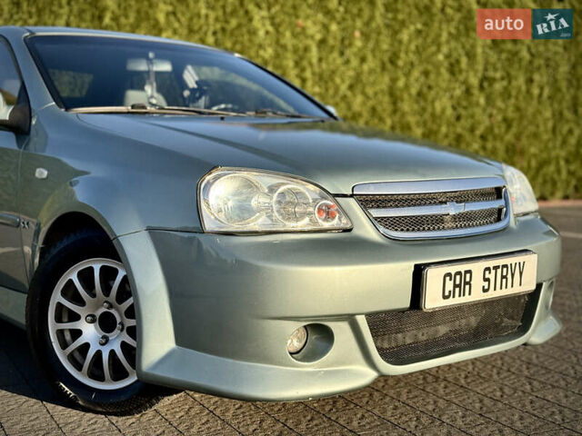 Зелений Шевроле Лачетті, об'ємом двигуна 1.8 л та пробігом 296 тис. км за 4200 $, фото 13 на Automoto.ua