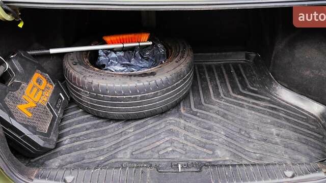 Зелений Шевроле Лачетті, об'ємом двигуна 1.8 л та пробігом 388 тис. км за 5399 $, фото 10 на Automoto.ua