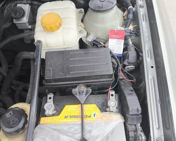 Зеленый Шевроле Лачетти, объемом двигателя 1.6 л и пробегом 259 тыс. км за 4300 $, фото 18 на Automoto.ua