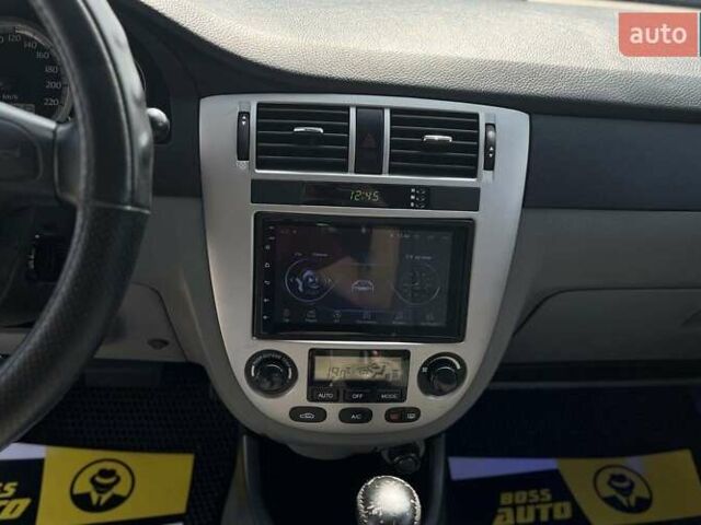 Зелений Шевроле Лачетті, об'ємом двигуна 1.8 л та пробігом 135 тис. км за 5990 $, фото 19 на Automoto.ua