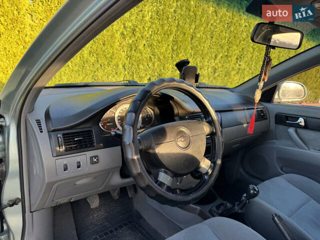 Зелений Шевроле Лачетті, об'ємом двигуна 1.8 л та пробігом 296 тис. км за 4200 $, фото 40 на Automoto.ua