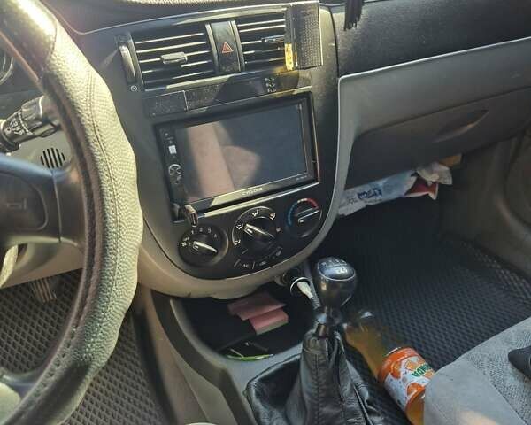Зеленый Шевроле Лачетти, объемом двигателя 1.6 л и пробегом 280 тыс. км за 3500 $, фото 1 на Automoto.ua