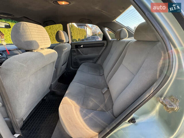 Зелений Шевроле Лачетті, об'ємом двигуна 1.8 л та пробігом 296 тис. км за 4200 $, фото 33 на Automoto.ua