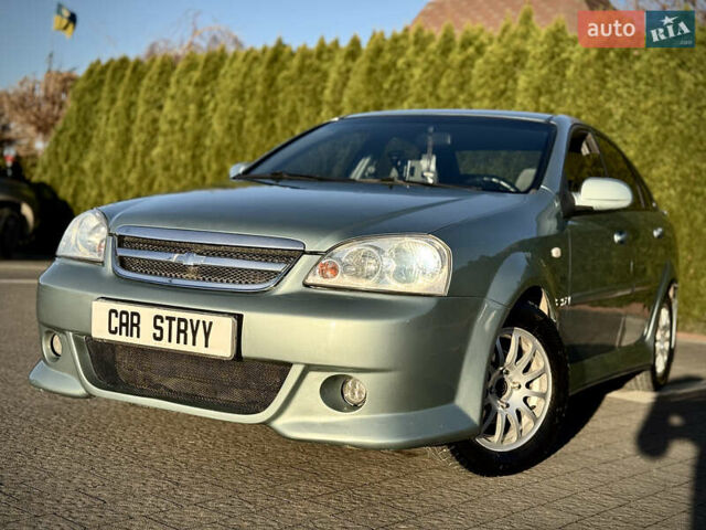 Зелений Шевроле Лачетті, об'ємом двигуна 1.8 л та пробігом 296 тис. км за 4200 $, фото 9 на Automoto.ua
