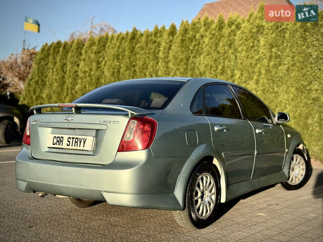 Зелений Шевроле Лачетті, об'ємом двигуна 1.8 л та пробігом 296 тис. км за 4200 $, фото 21 на Automoto.ua